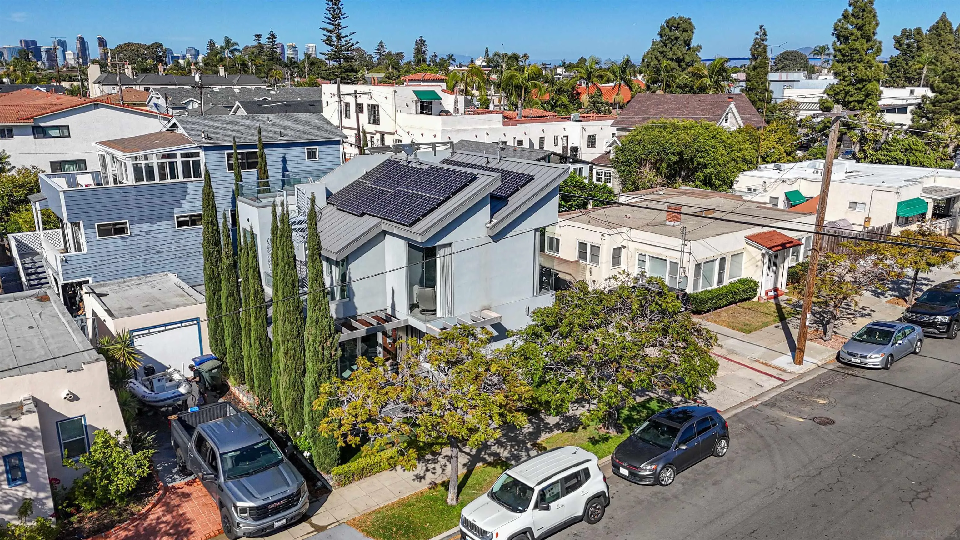 911 9th Street Coronado, CA 92118 - Photo 36 of 45 an aerial view of multiple houses with a yard