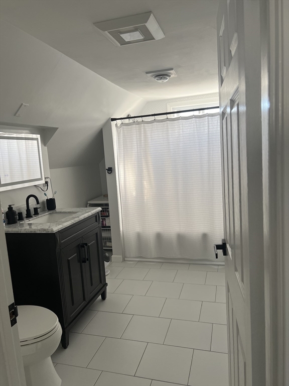 15 Neptune St Court Lynn, MA 01905 - Photo 13 of 35 a view of bathroom with a toilet sink and mirror