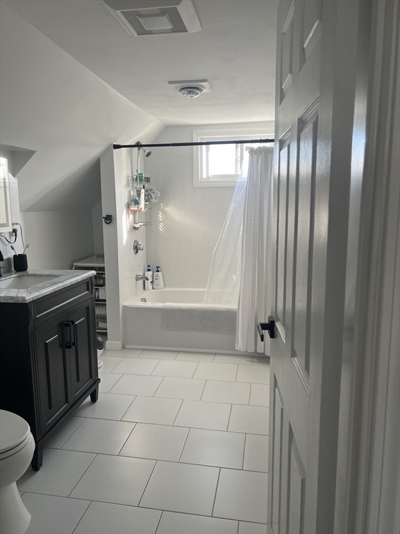 15 Neptune St Court Lynn, MA 01905 - Photo 14 of 35 a bathroom with a sink a toilet and shower