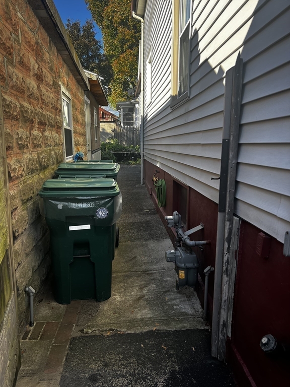 15 Neptune St Court Lynn, MA 01905 - Photo 28 of 35 a view of a house with backyard and sitting area