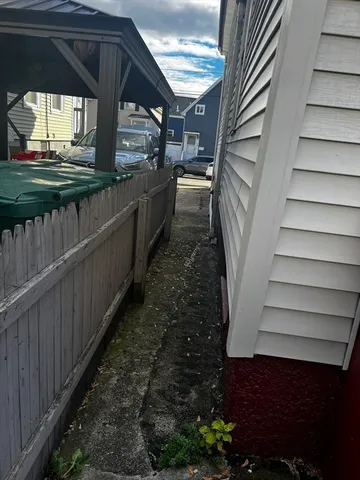 a view of a back yard of the house