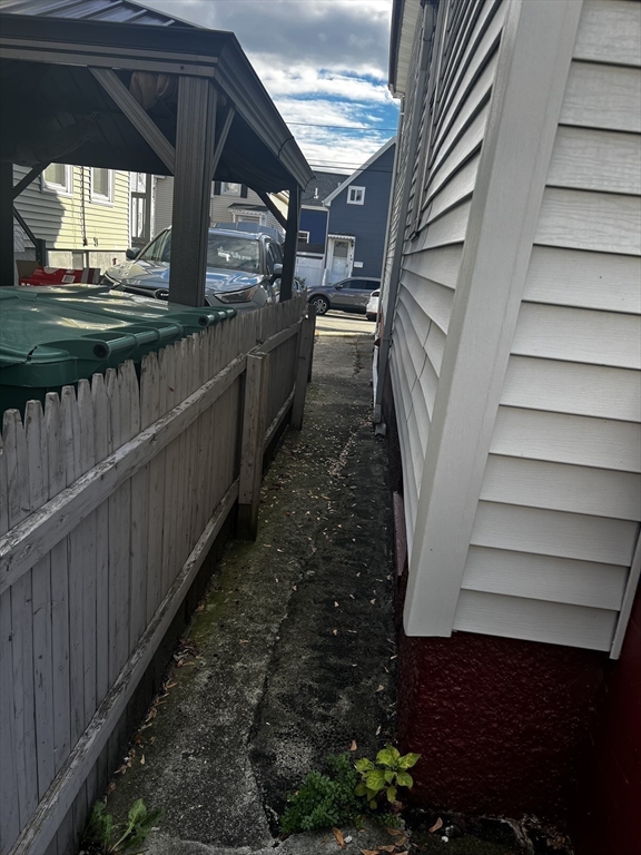 15 Neptune St Court Lynn, MA 01905 - Photo 29 of 35 a view of a back yard from a balcony