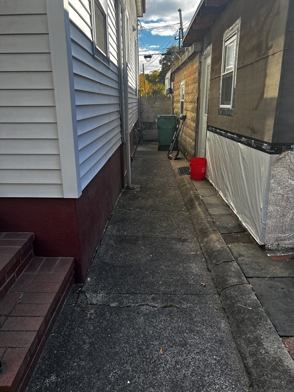 15 Neptune St Court Lynn, MA 01905 - Photo 30 of 35 a view of a back yard of the house