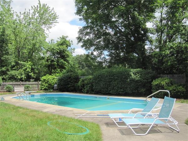 29 Spartan Arrow Road Littleton, MA 01460 - Photo 6 of 30 a view of a swimming pool with a patio