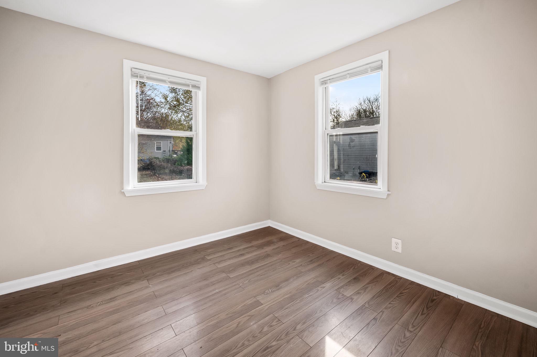 46 Aberdeen Avenue Aberdeen, MD 21001 - Photo 15 of 23 a view of an empty room with wooden floor and a window