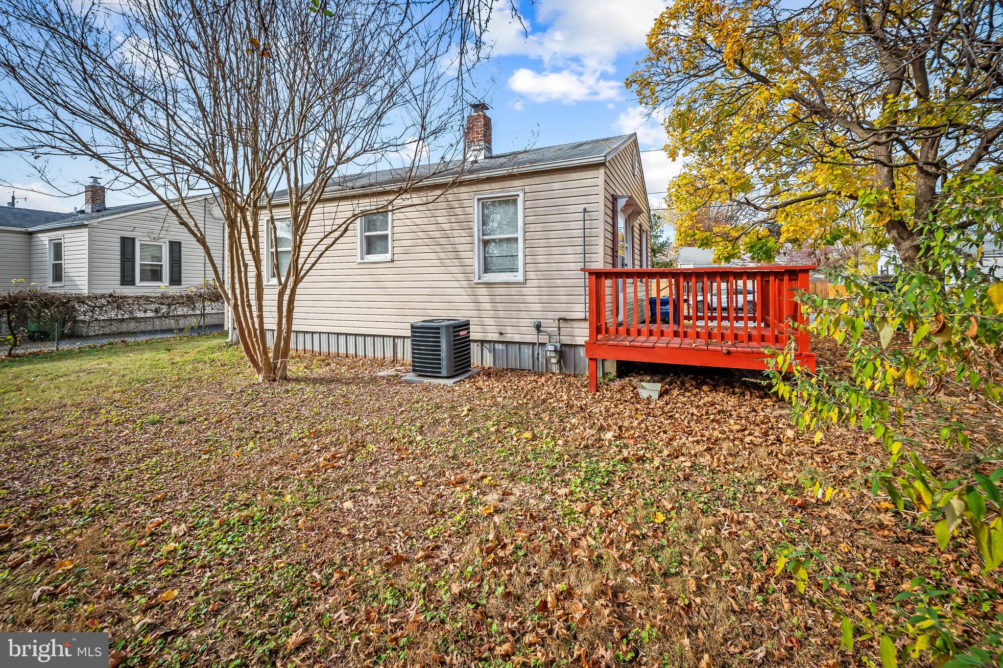 46 Aberdeen Avenue Aberdeen, MD 21001 - Photo 18 of 23 a view of a house with a yard and wooden bench