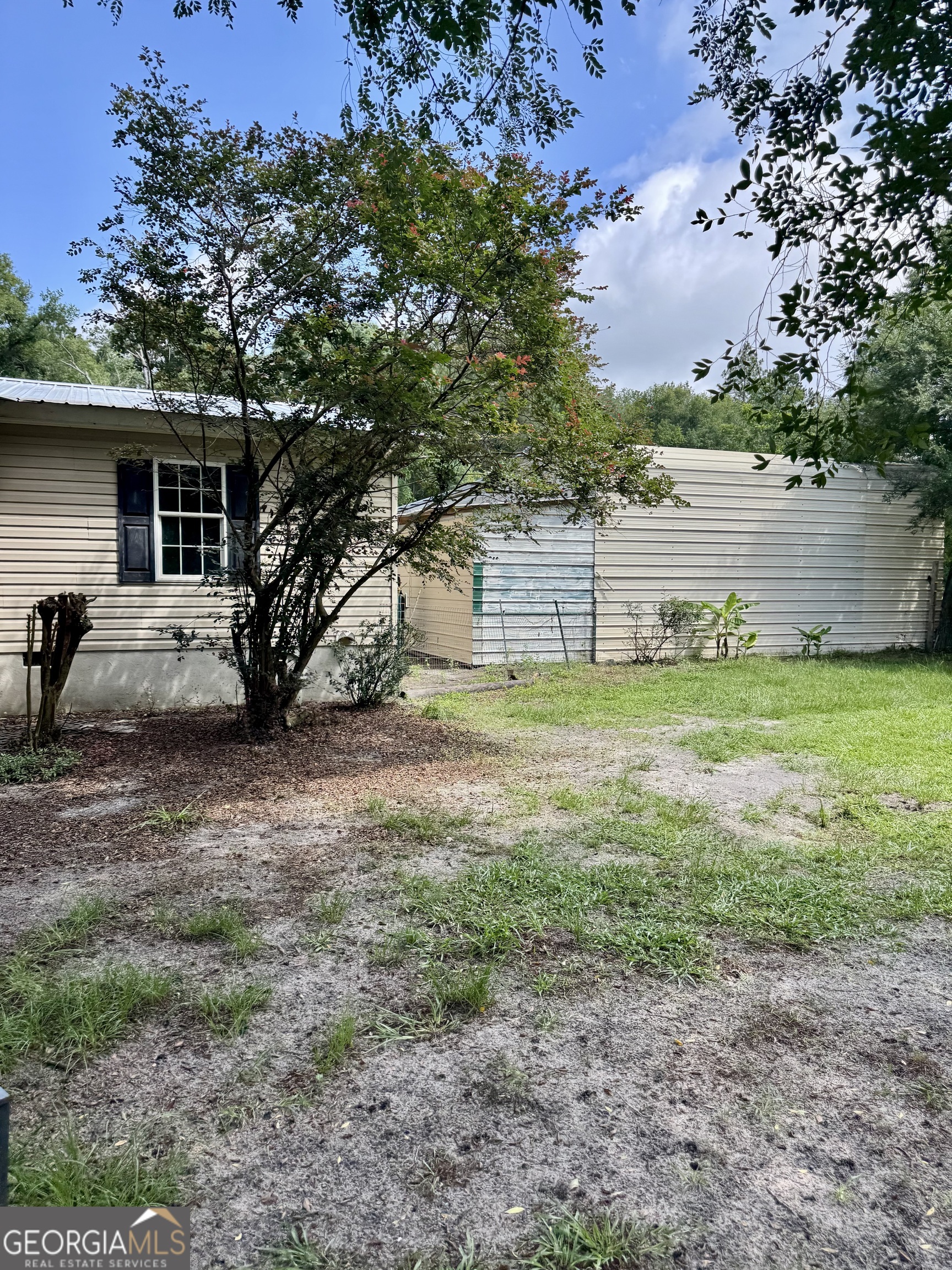 361 Le Stanfield Road Glennville, GA 30427 - Photo 21 of 22 Three car shop with roll up doors.