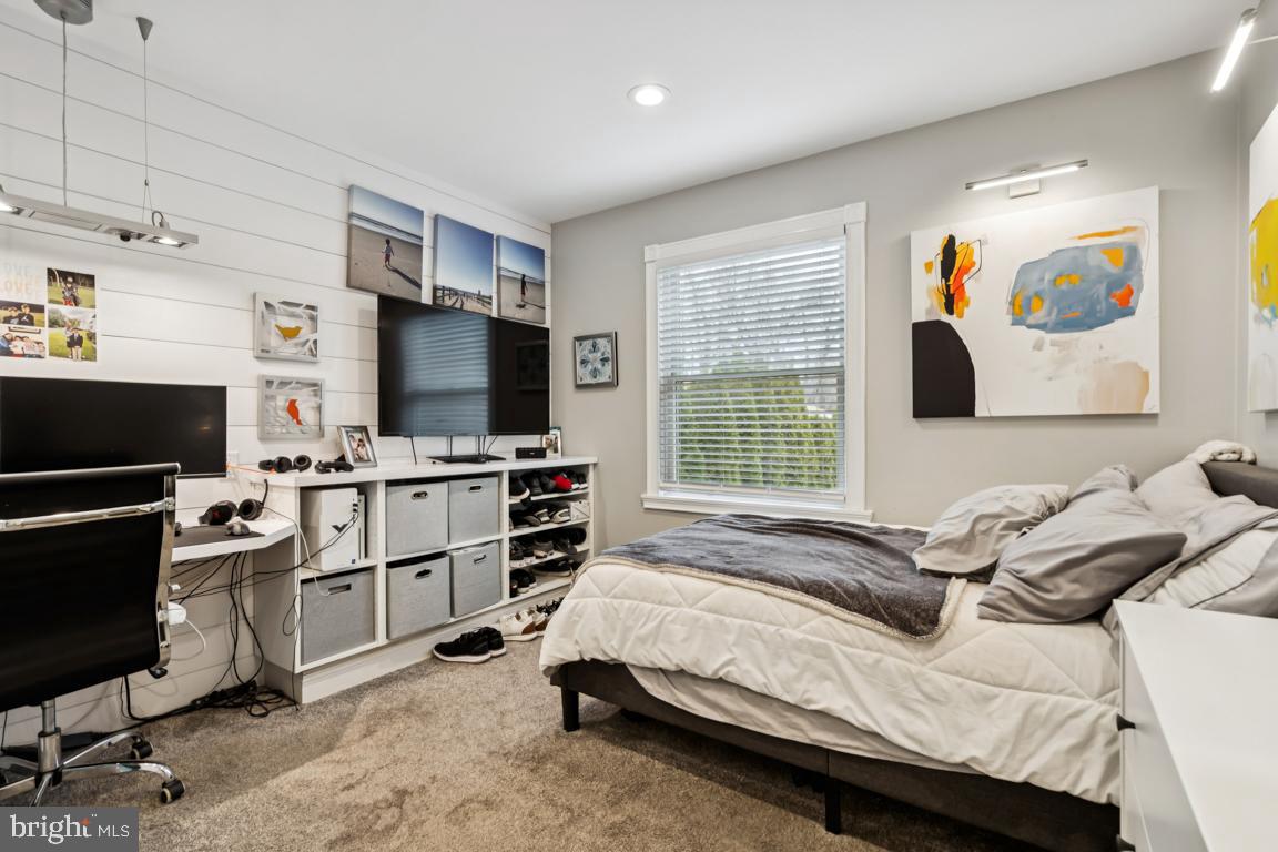 9 North Lenola Road Moorestown, NJ 08057 - Photo 13 of 25 a bedroom with a bed and a flat screen tv