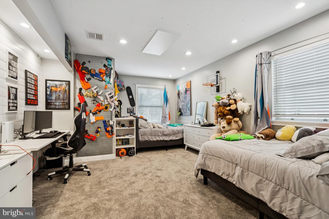 9 North Lenola Road Moorestown, NJ 08057 - Photo 14 of 25 a bedroom with bed and a large window