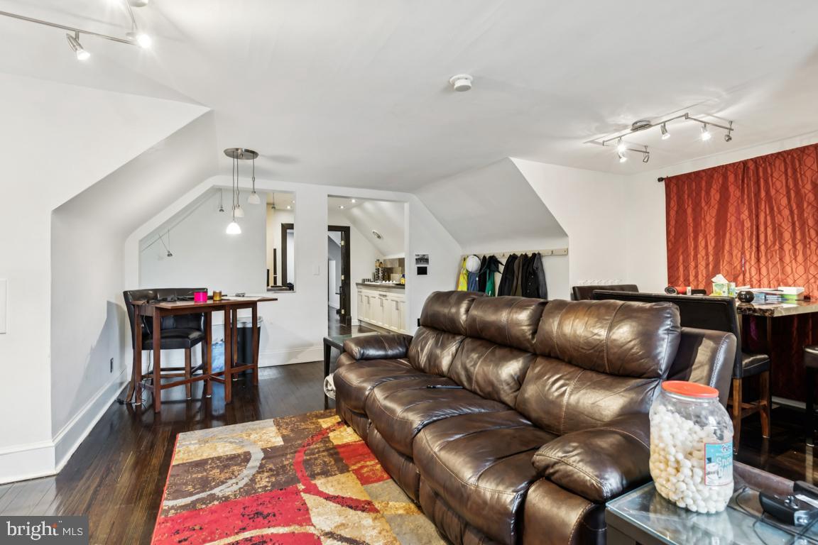 9 North Lenola Road Moorestown, NJ 08057 - Photo 18 of 25 a living room with furniture and a dining table
