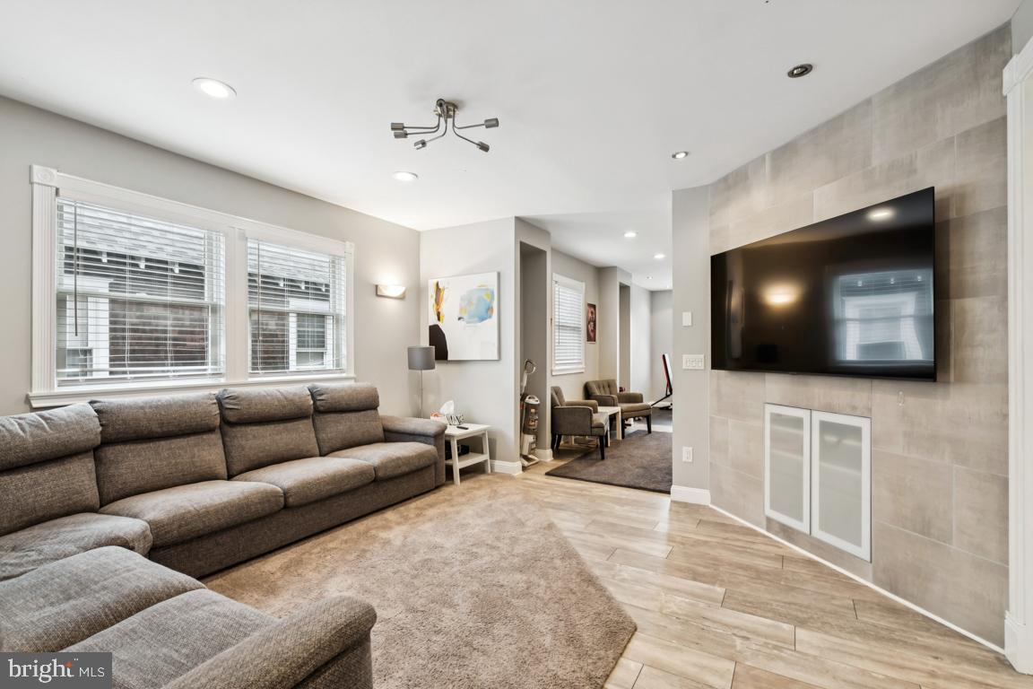 9 North Lenola Road Moorestown, NJ 08057 - Photo 7 of 25 a living room with furniture and a flat screen tv