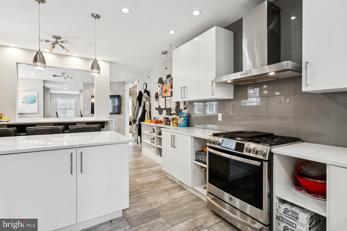 9 North Lenola Road Moorestown, NJ 08057 - Photo 10 of 25 a kitchen with stainless steel appliances granite countertop a stove and a sink