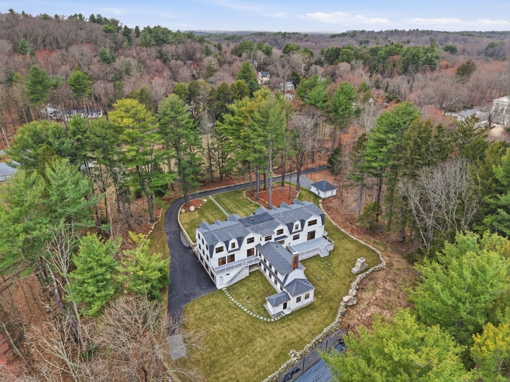22 Lincoln Road Lincoln, MA 01773 - Photo 2 of 42 an aerial view of a house with garden space and mountain view