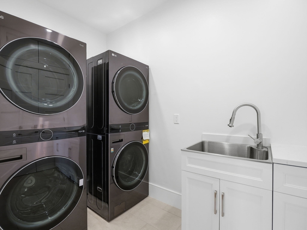 22 Lincoln Road Lincoln, MA 01773 - Photo 34 of 42 a utility room with sink dryer and washer
