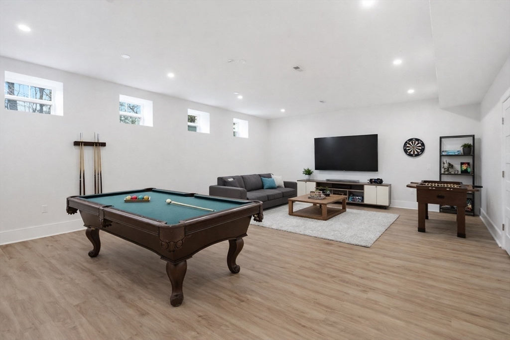 22 Lincoln Road Lincoln, MA 01773 - Photo 38 of 42 a room with furniture pool table and a flat screen tv