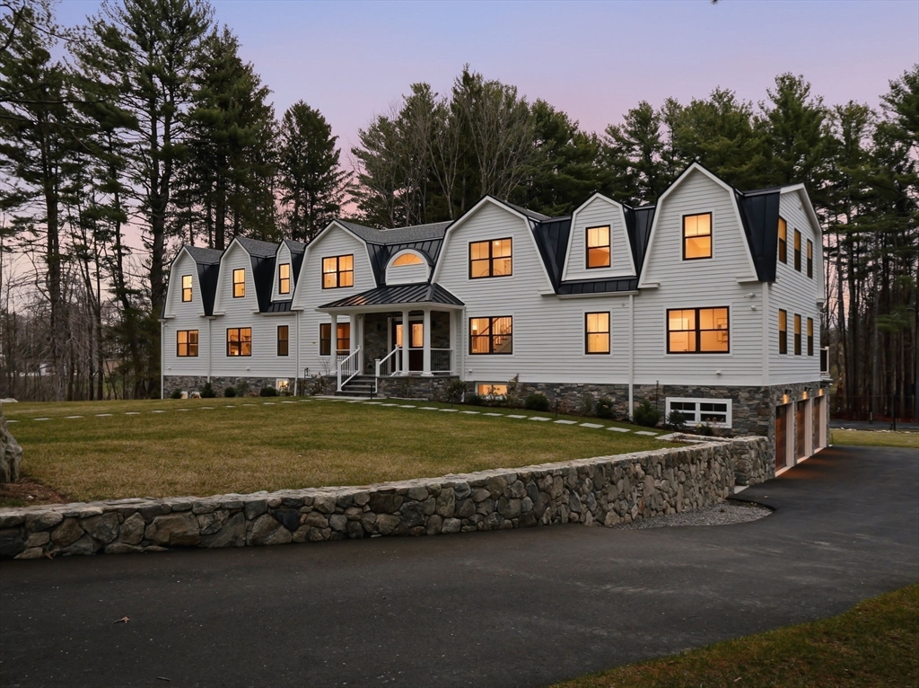 22 Lincoln Road Lincoln, MA 01773 - Photo 4 of 42 a front view of a house with a yard