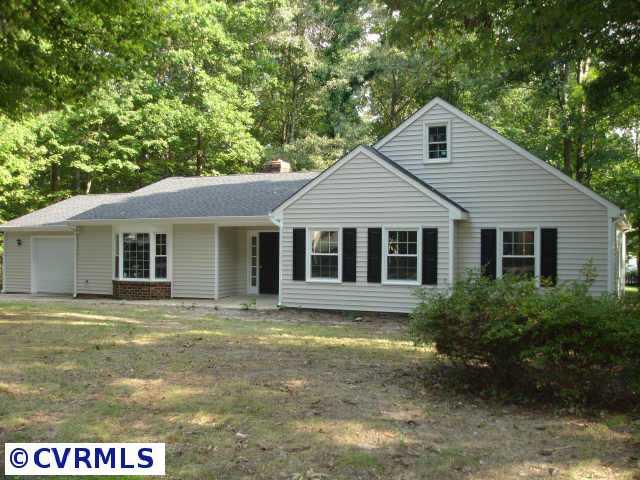 13217 Queensgate Road Midlothian, VA 23114 - Photo 1 of 10 Exterior Front - Paved driveway to direct entry 1.5 car garage w/built-in workshop