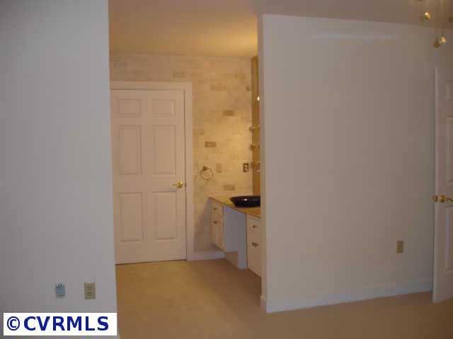 13217 Queensgate Road Midlothian, VA 23114 - Photo 8 of 10 Other - 6 x 6 Vanity area features vanity accessible by wheelchair with marble vanity top and tile +marble surround.