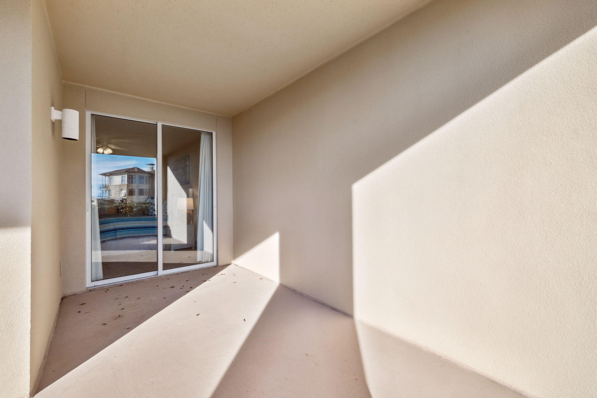 4045 West County Highway 30A, Unit 108 Santa Rosa Beach, FL 32459 - Photo 19 of 29 a view of a big room with wooden floor and windows