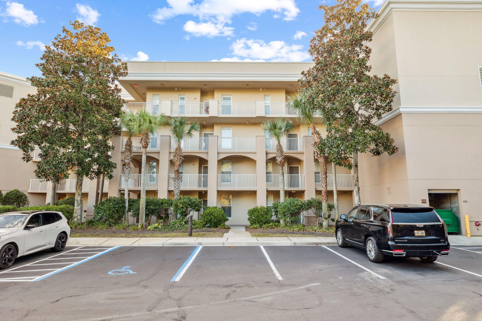 4045 West County Highway 30A, Unit 108 Santa Rosa Beach, FL 32459 - Photo 22 of 29 a car parked in front of a building