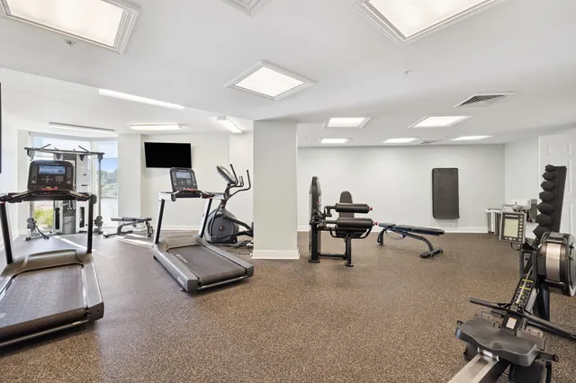 a view of a room with gym equipment