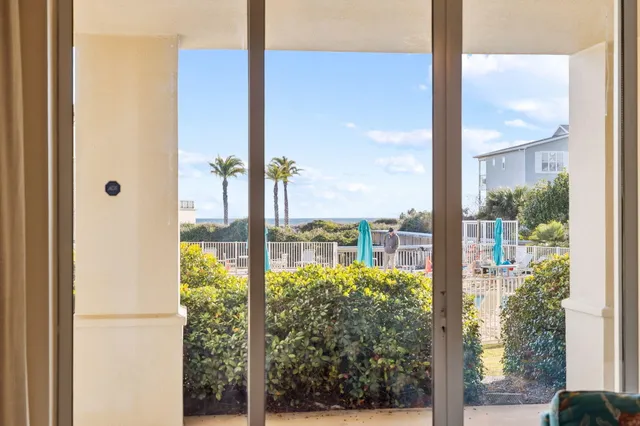 a view of a glass door and porch