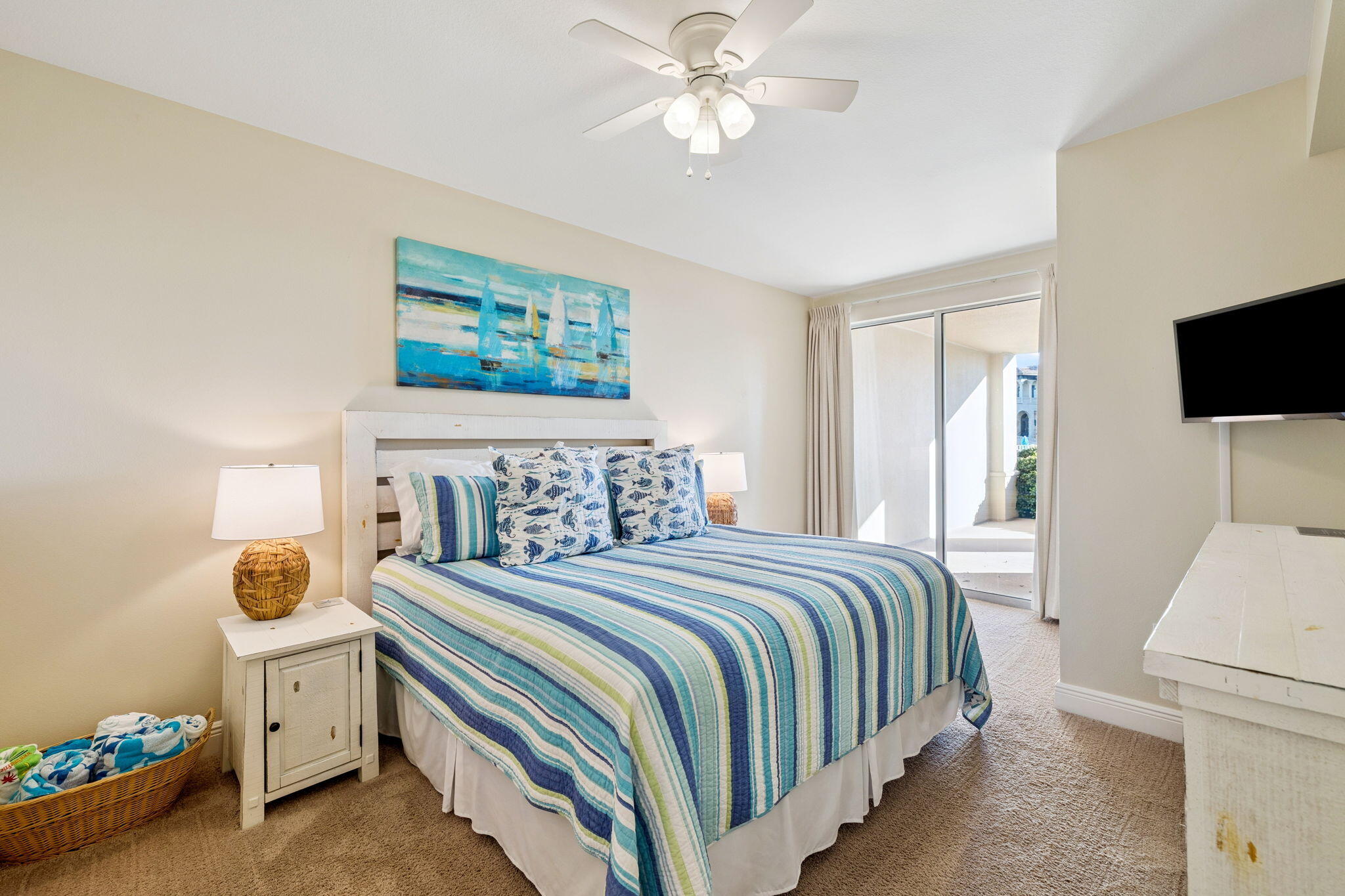 4045 West County Highway 30A, Unit 108 Santa Rosa Beach, FL 32459 - Photo 10 of 29 a bedroom with a bed and a tv