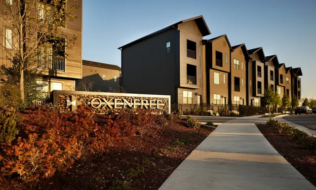 a view of a city with tall buildings