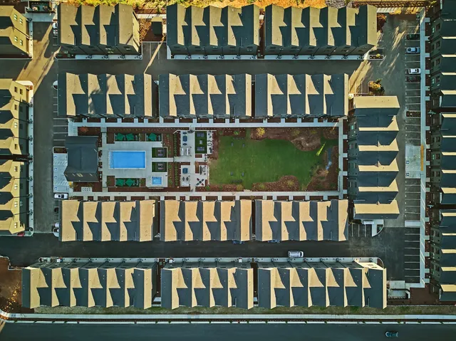 a kitchen with stainless steel appliances a refrigerator sink and microwave