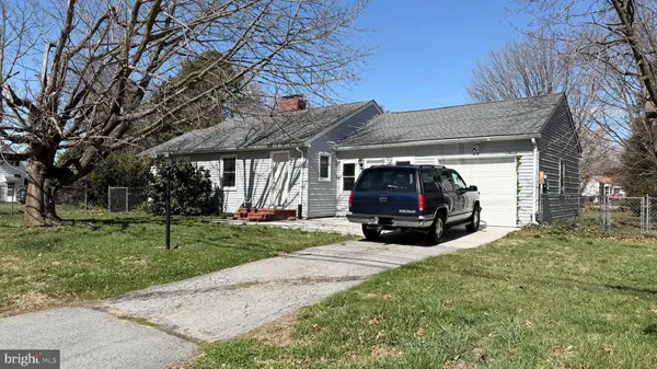 a view of a house with a back yard
