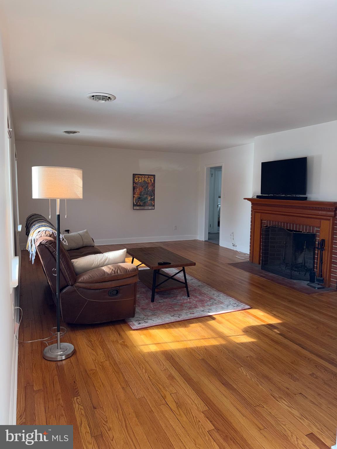 915 East Division Street Dover, DE 19901 - Photo 6 of 27 Living Room 1/Fireplace 1