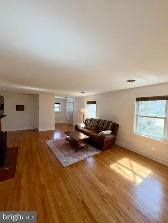 a bed room with a bed and a window