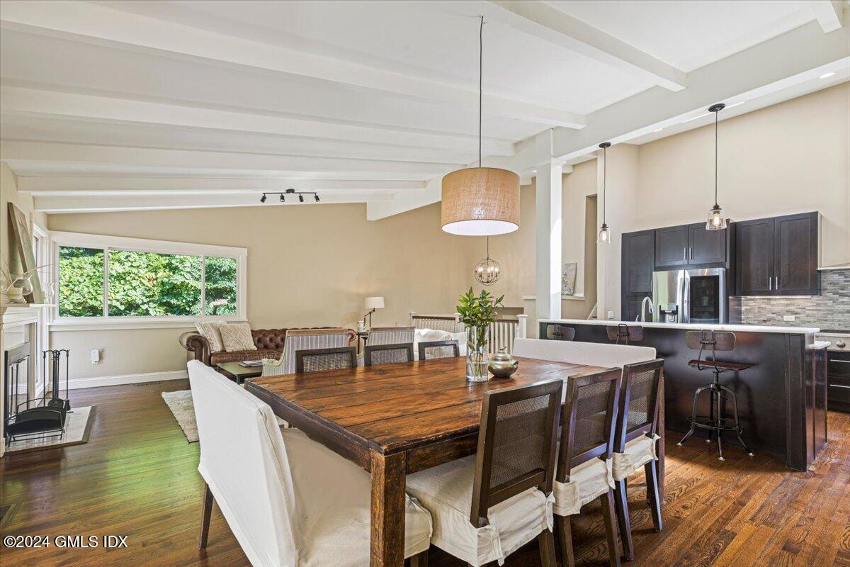 70 Gregory Road Cos Cob, CT 06807 - Photo 7 of 39 a dining table with chairs and window