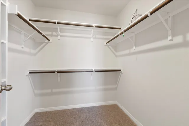 a bathroom with 2 sink and a mirror