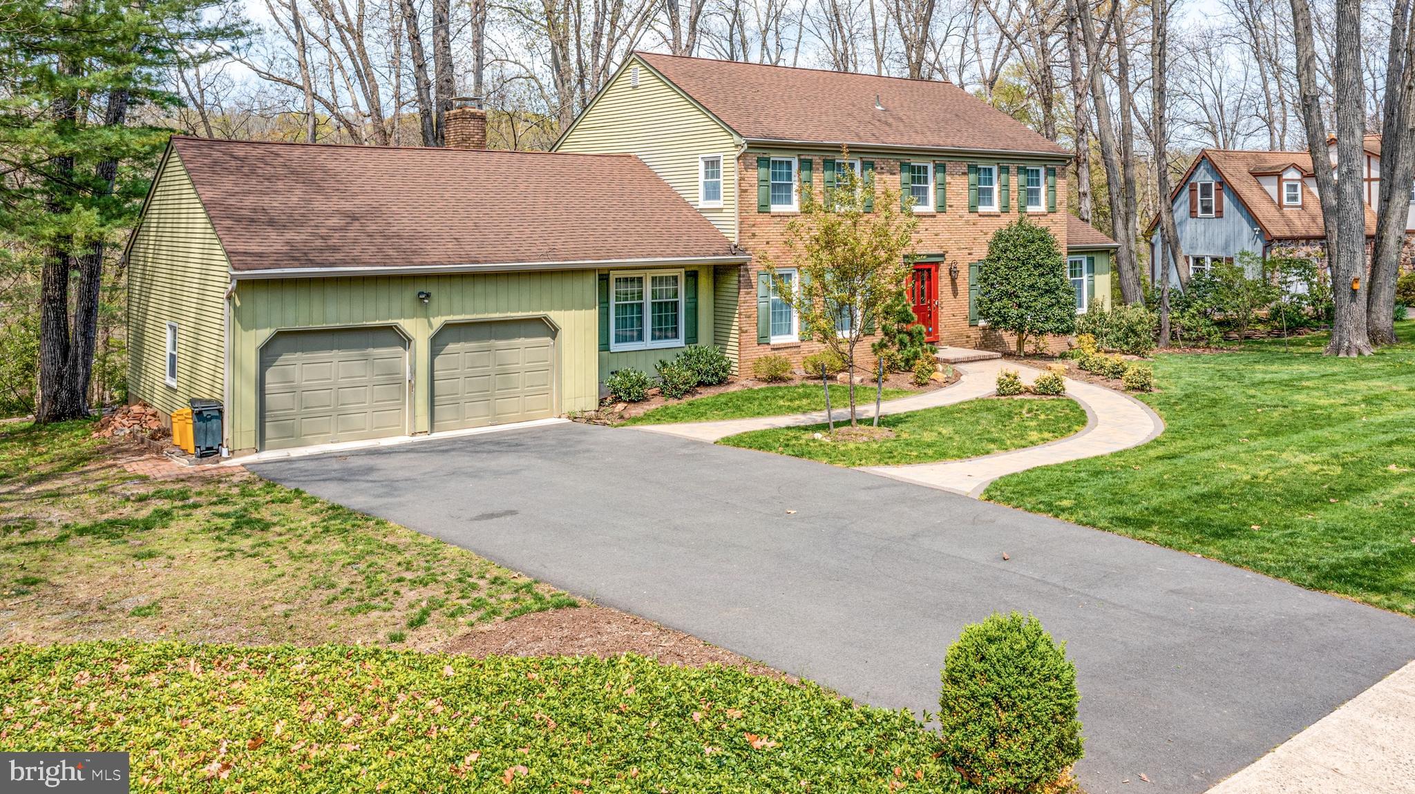 64 Lochatong Road Ewing, NJ 08628 - Photo 2 of 40 front of home nestled in the Mountainview section