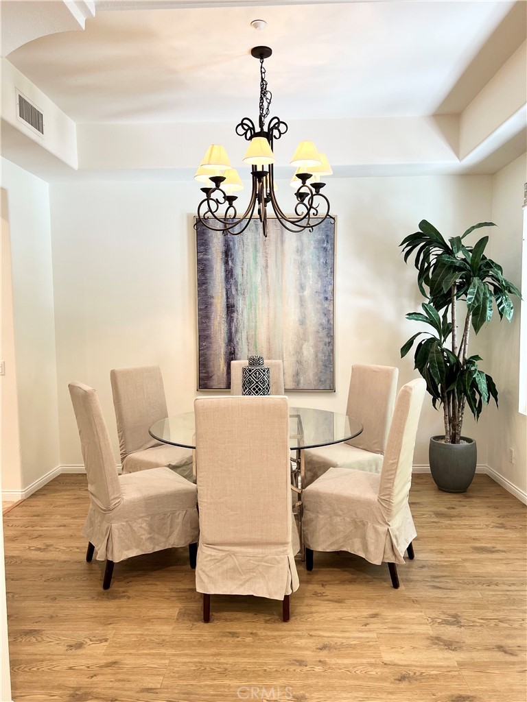 22 San Sovino Newport Coast, CA 92657 - Photo 13 of 20 a living room with furniture and flowers