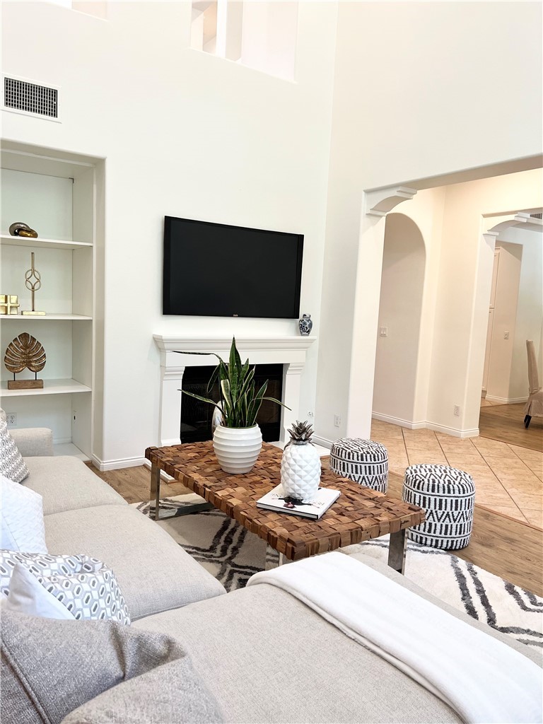 22 San Sovino Newport Coast, CA 92657 - Photo 16 of 20 a living room with furniture and a fireplace