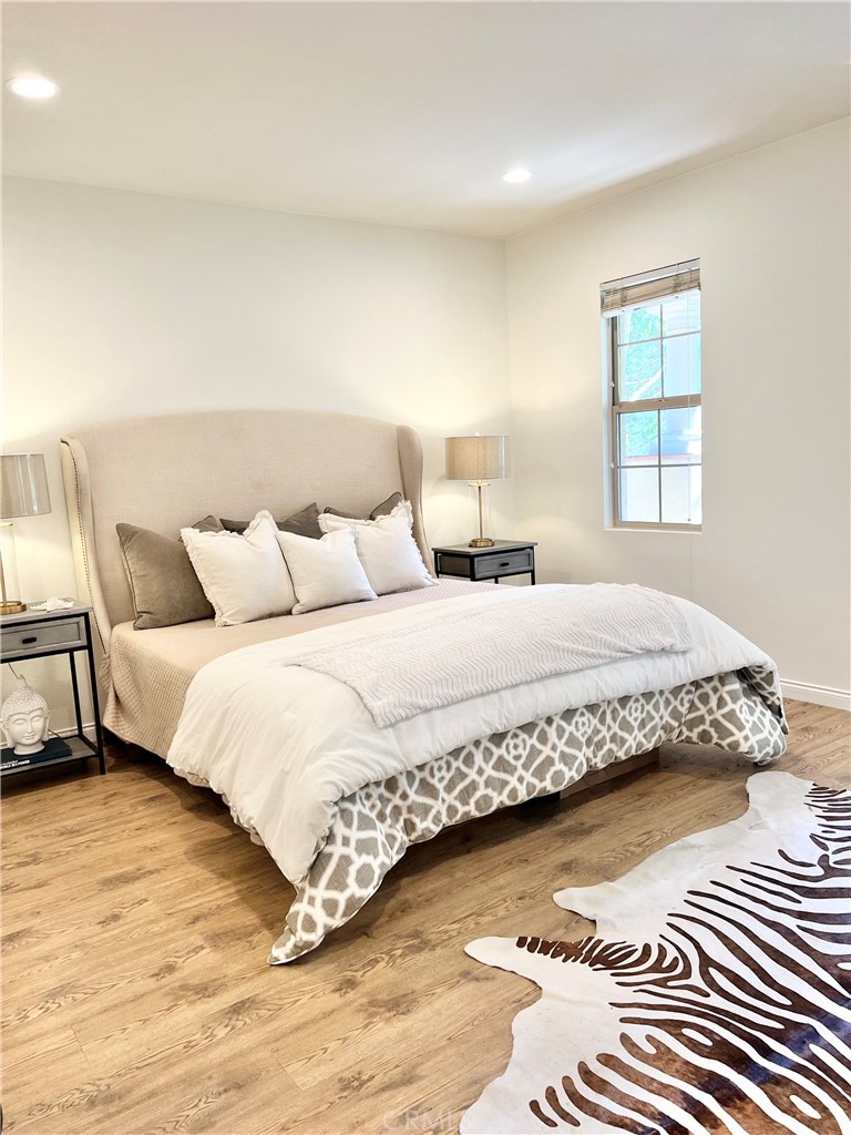 22 San Sovino Newport Coast, CA 92657 - Photo 2 of 20 a bedroom with a bed and a window