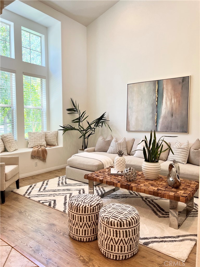 22 San Sovino Newport Coast, CA 92657 - Photo 3 of 20 a living room with furniture and a large window