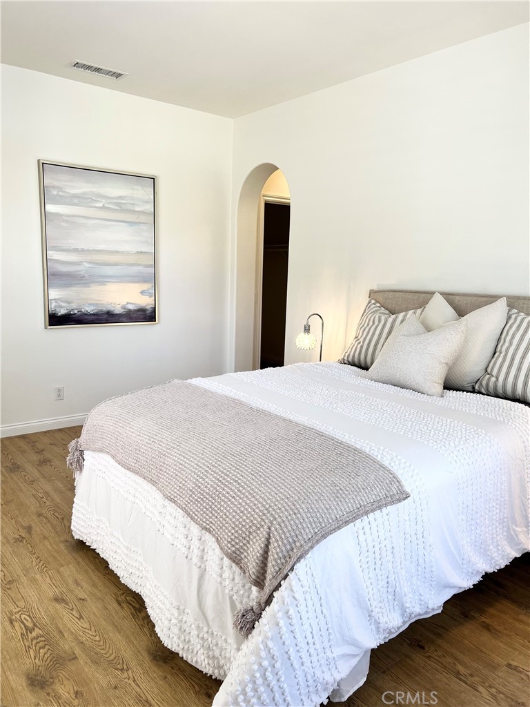 22 San Sovino Newport Coast, CA 92657 - Photo 7 of 20 a bedroom with bed and wall painting