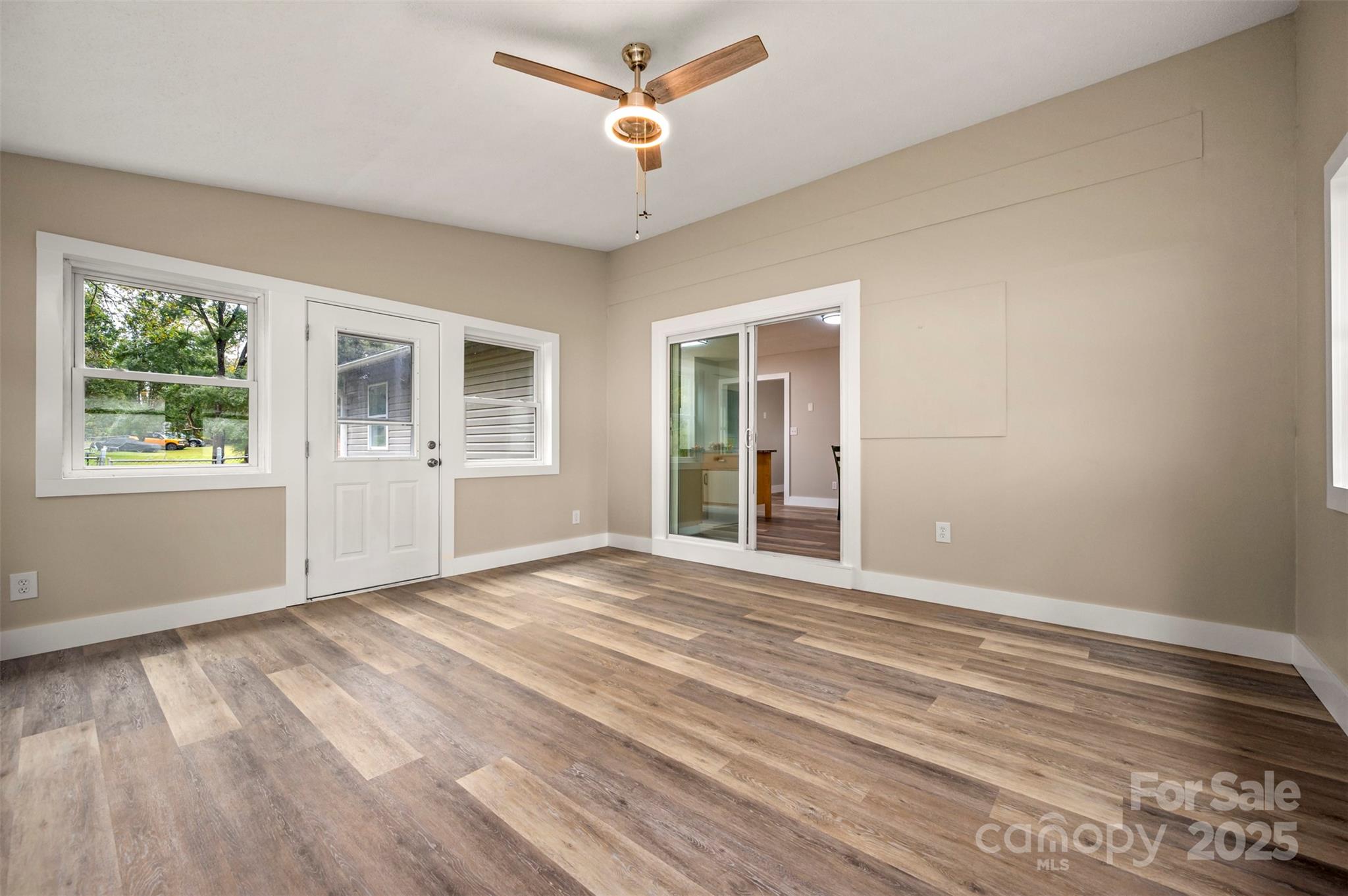569 Lanning Road Hendersonville, NC 28792 - Photo 11 of 32 a view of an empty room with a window