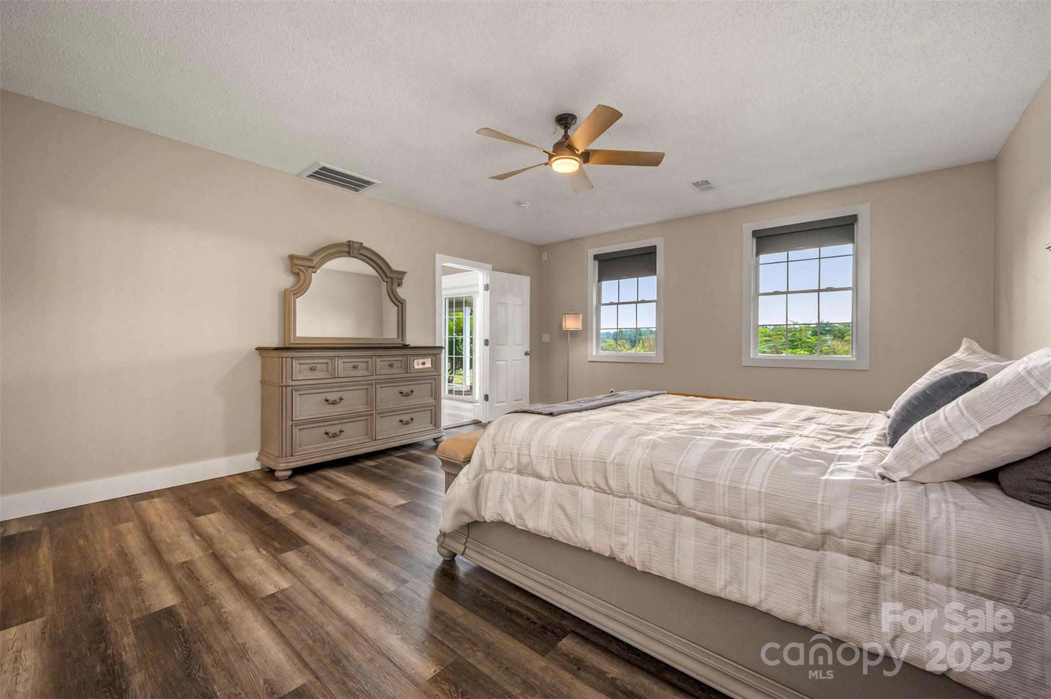 569 Lanning Road Hendersonville, NC 28792 - Photo 16 of 32 a bedroom with a bed and window