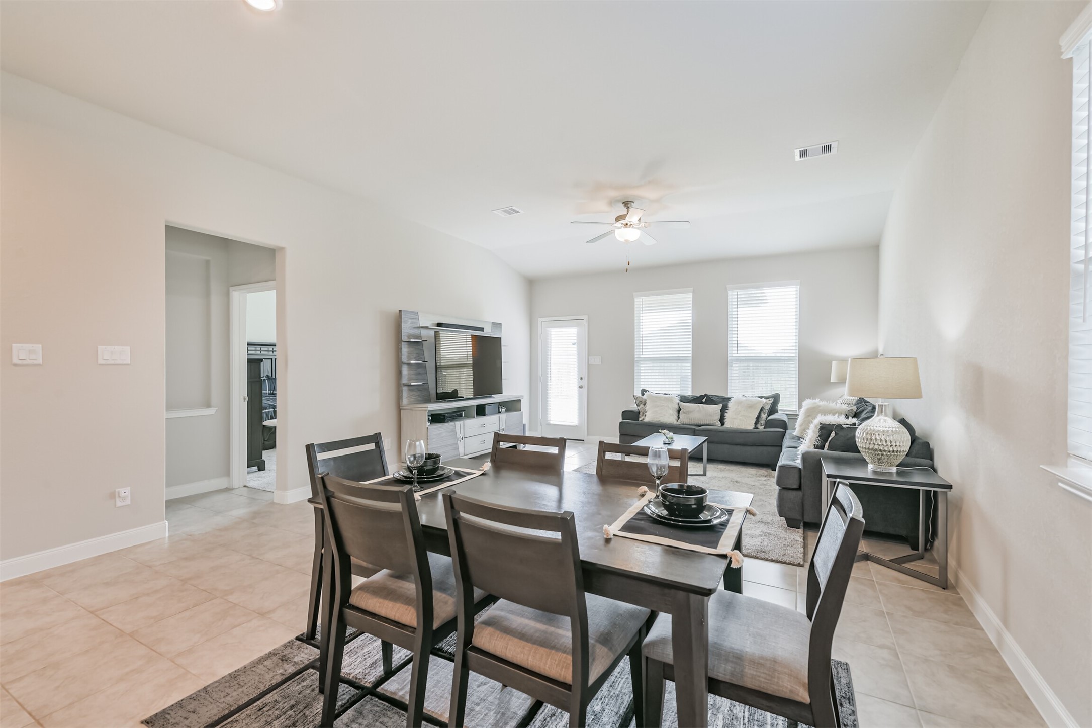 918 Pismo Lane Rosharon, TX 77583 - Photo 11 of 44 a view of a dining room with furniture