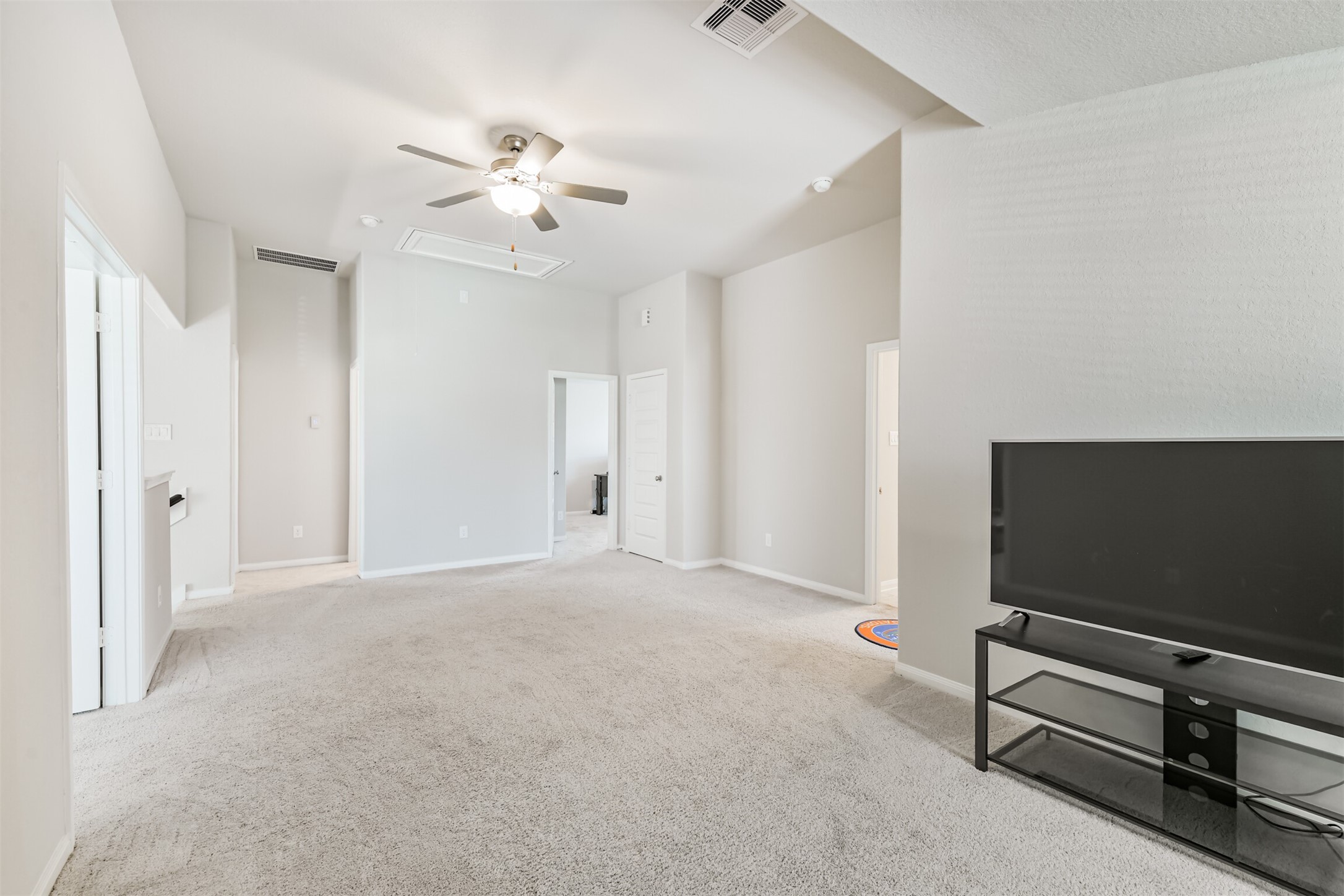 918 Pismo Lane Rosharon, TX 77583 - Photo 29 of 44 a view of an empty room with a flat screen tv