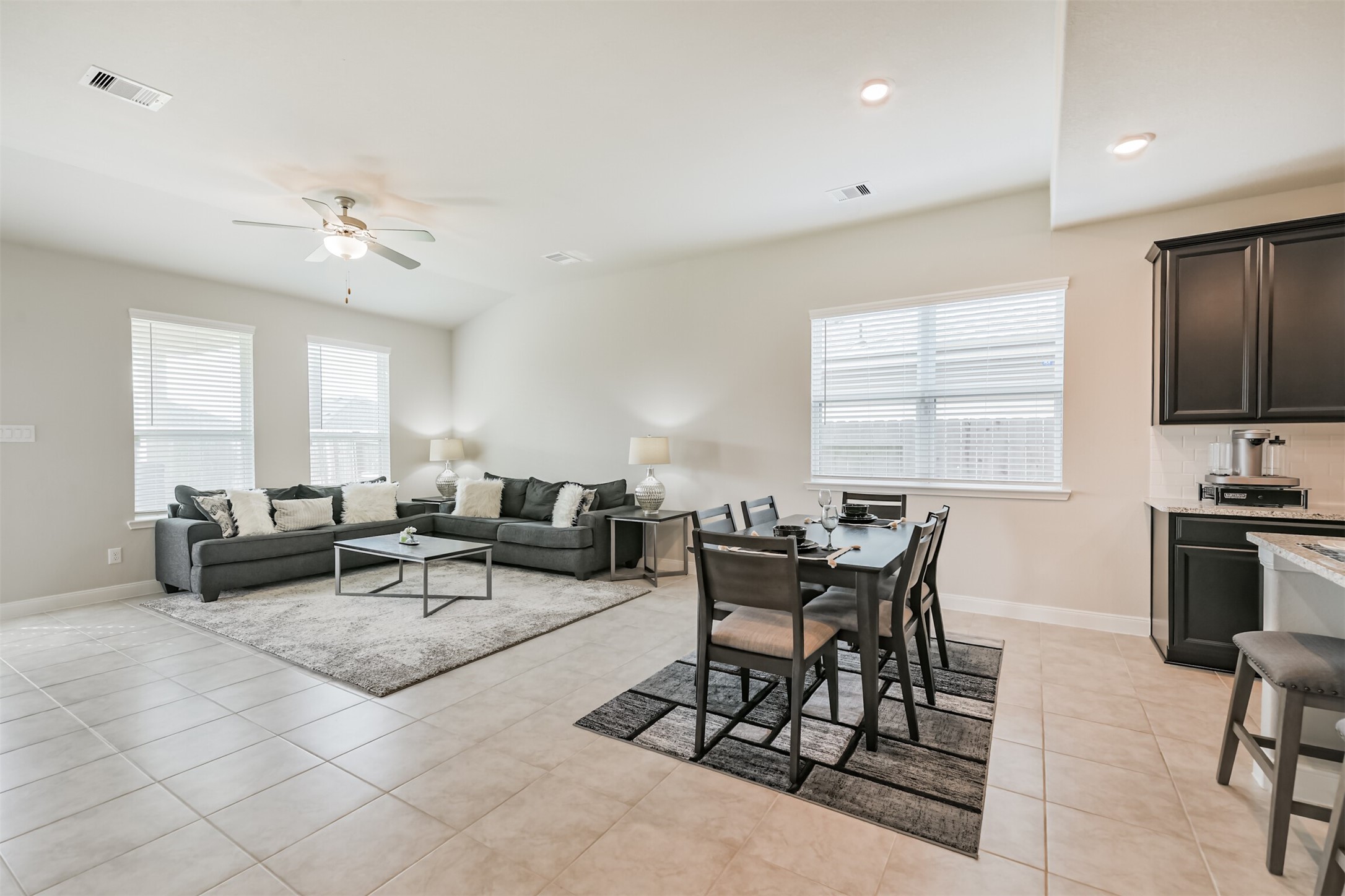 918 Pismo Lane Rosharon, TX 77583 - Photo 7 of 44 a living room with furniture a chandelier and a window