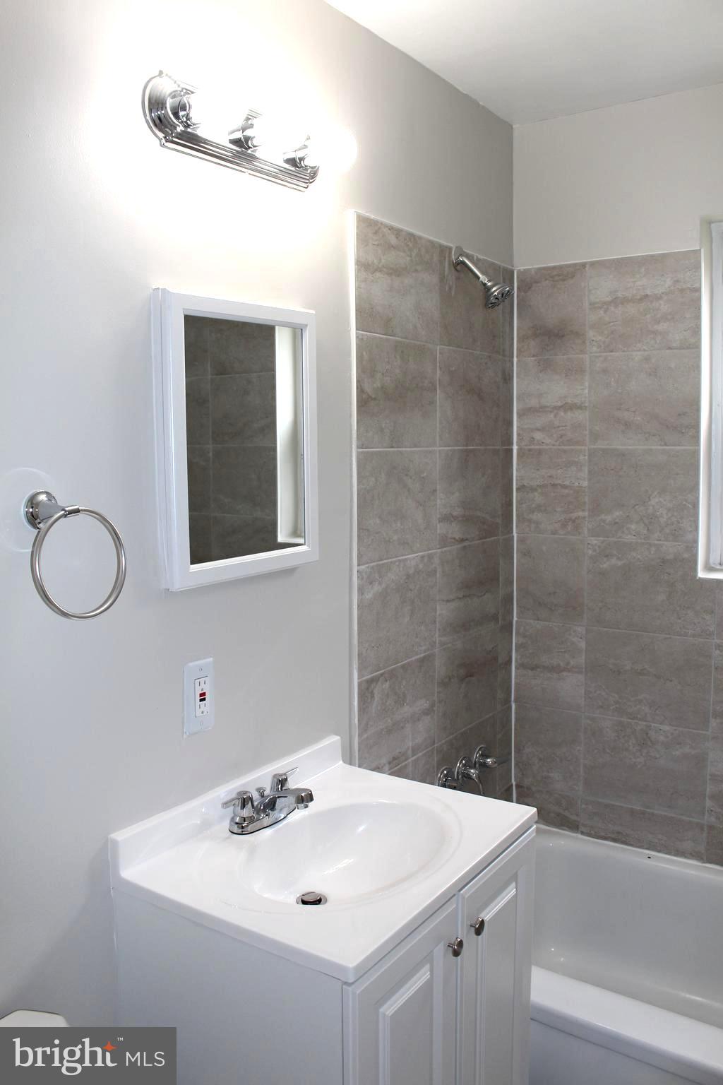 11810 Grandview Avenue Silver Spring, MD 20902 - Photo 21 of 33 Renovated First Level Bathroom