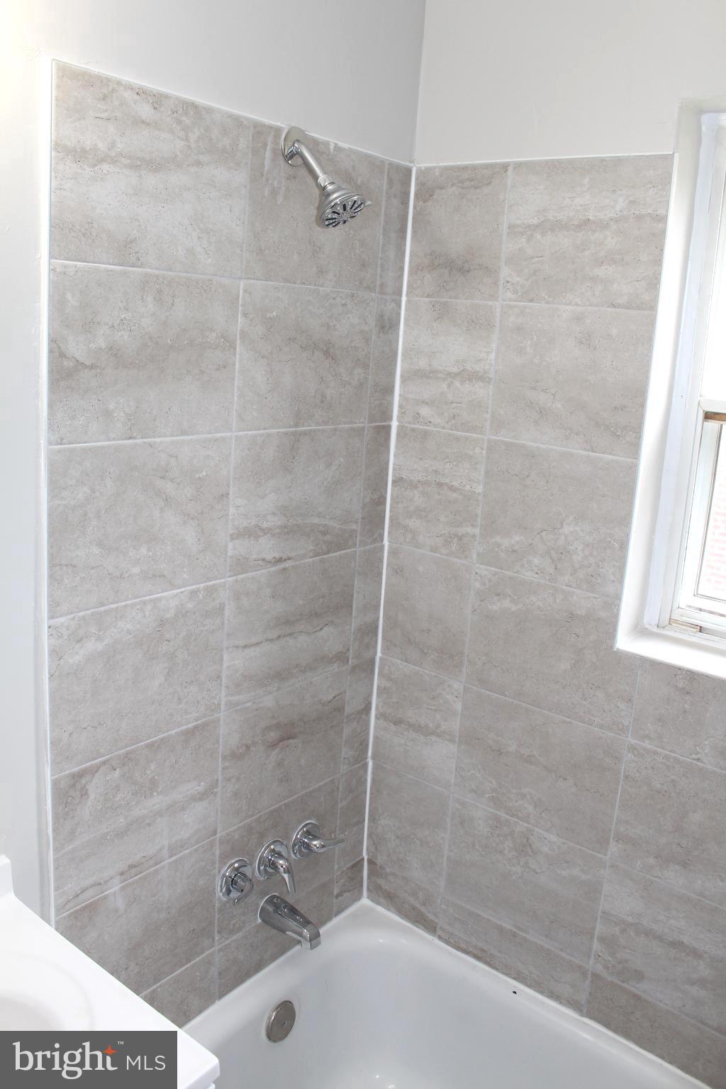 11810 Grandview Avenue Silver Spring, MD 20902 - Photo 22 of 33 Renovated First Level Bathroom