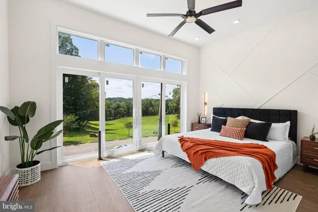 a bedroom with furniture and a window