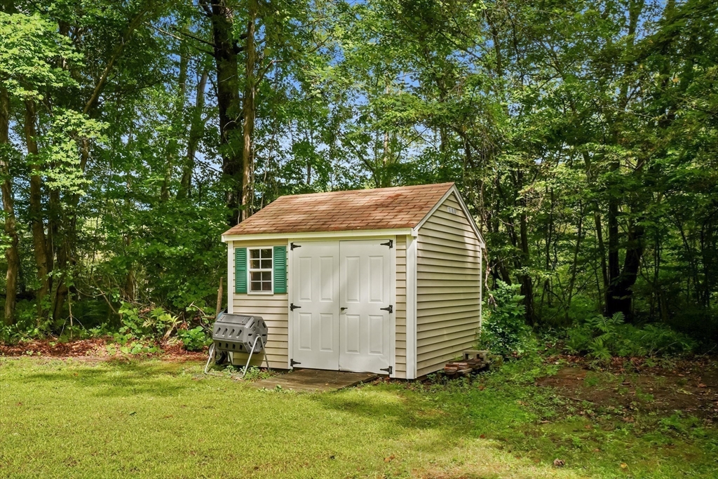50 Middle Road Amesbury, MA 01913 - Photo 26 of 30 a view of a house with a yard