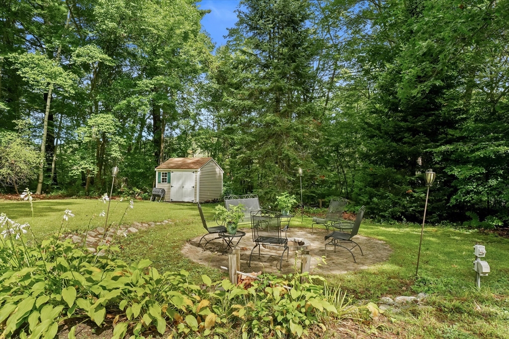 50 Middle Road Amesbury, MA 01913 - Photo 30 of 30 a garden with trees in the background
